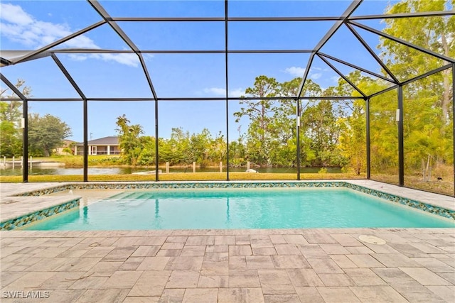 outdoor pool featuring a lanai and a patio