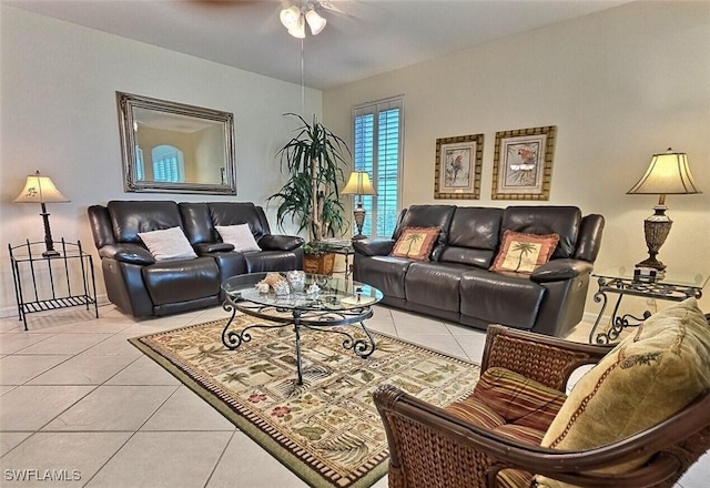 tiled living room featuring ceiling fan