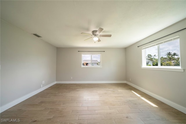 6080 Park Rd, Fort Myers, FL 33908 - spare room with ceiling fan, wood finished floors, and baseboards