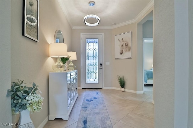 entryway featuring light tile patterned flooring and crown molding