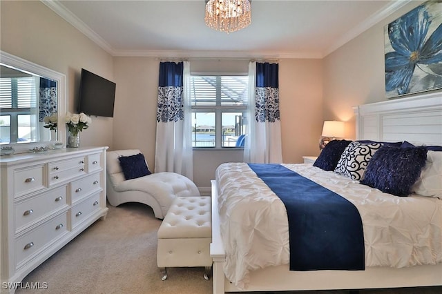 carpeted bedroom with ornamental molding and a chandelier