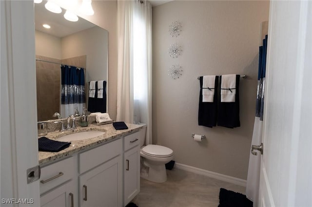 bathroom with toilet, tile patterned floors, walk in shower, and vanity