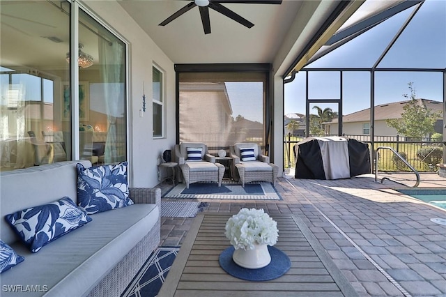 sunroom / solarium with ceiling fan