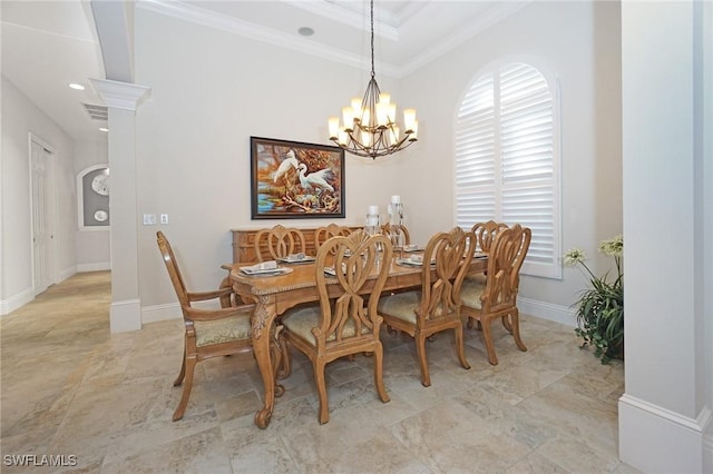 dining room featuring a notable chandelier and ornamental molding