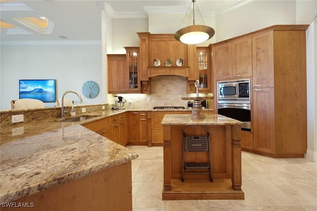 kitchen featuring sink, decorative light fixtures, light stone counters, kitchen peninsula, and stainless steel appliances