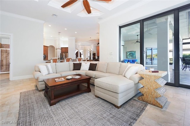 living room featuring ceiling fan, crown molding, and coffered ceiling