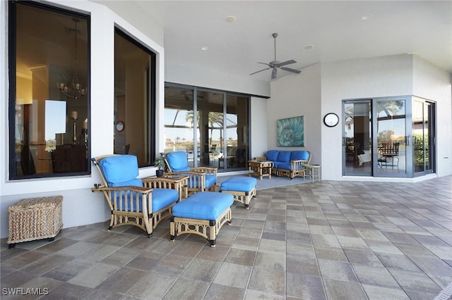 view of patio / terrace featuring ceiling fan