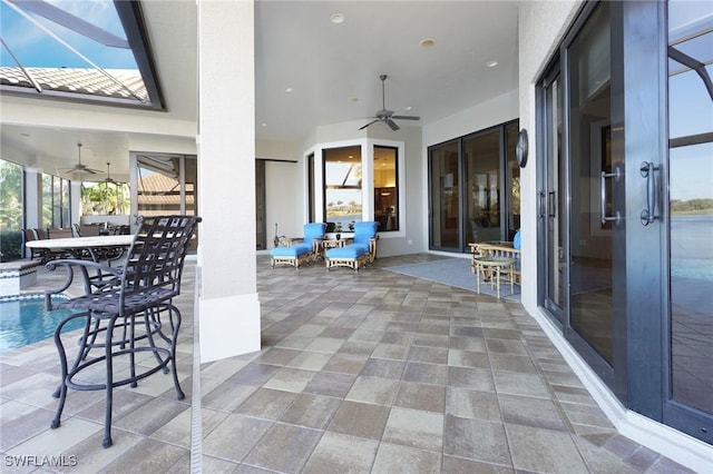 view of patio / terrace featuring ceiling fan