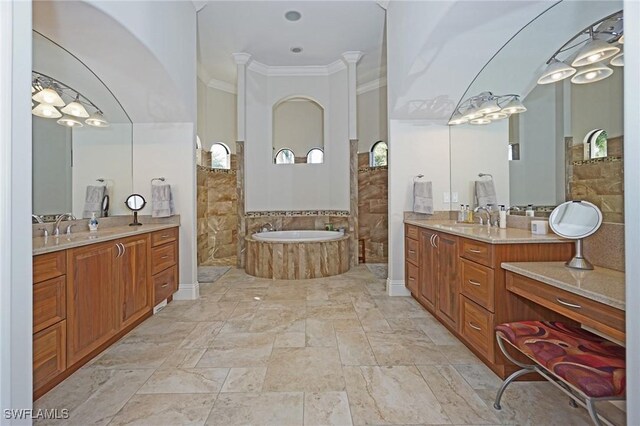 bathroom with vanity, shower with separate bathtub, and ornamental molding