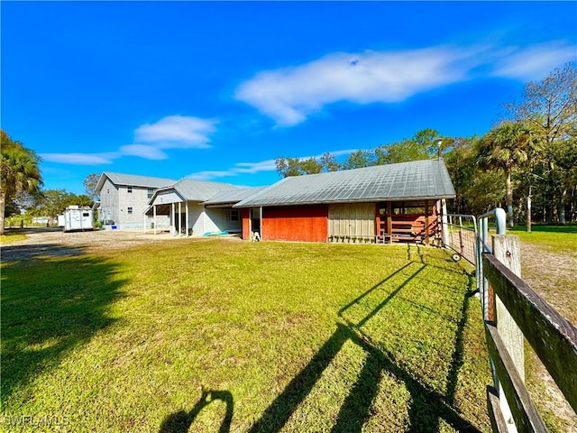 view of front of property featuring an outbuilding