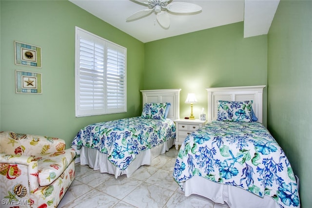 bedroom featuring ceiling fan