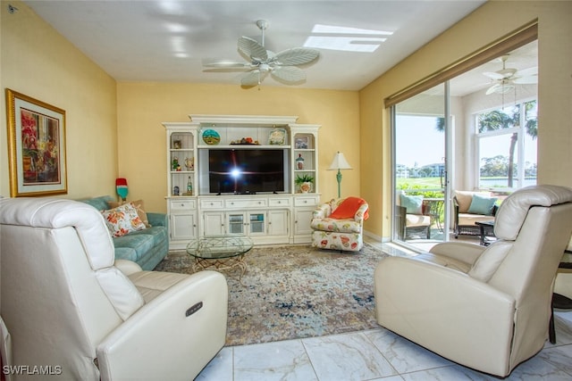 living room featuring ceiling fan