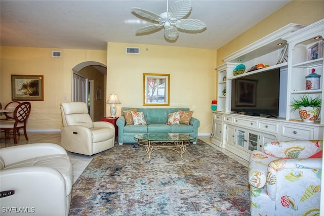 living room featuring ceiling fan