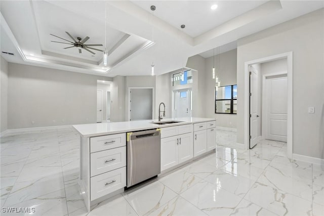 kitchen with a center island with sink, sink, white cabinetry, dishwasher, and a raised ceiling