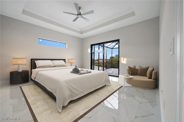 bedroom featuring a tray ceiling, access to exterior, and crown molding