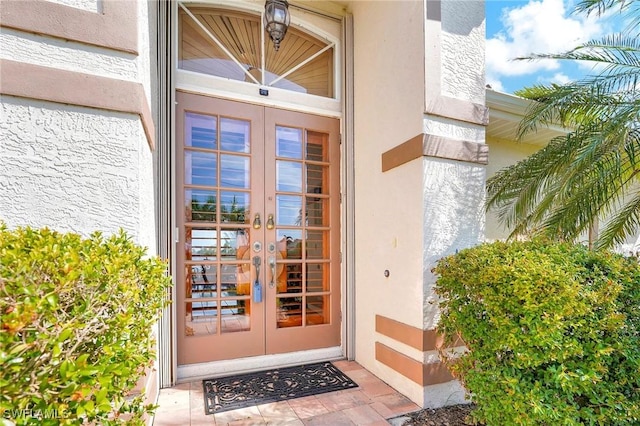 doorway to property featuring french doors