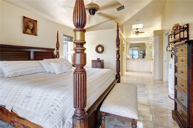 bedroom with vaulted ceiling, ensuite bath, and ceiling fan