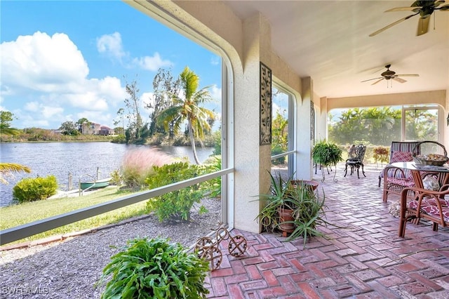 sunroom with a water view