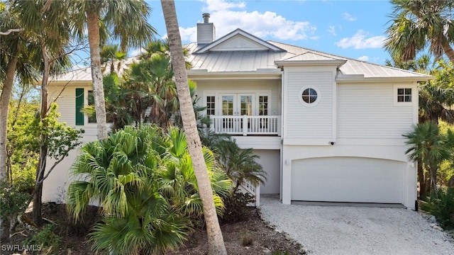 coastal home with a garage