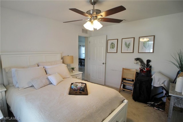 bedroom featuring light carpet and ceiling fan