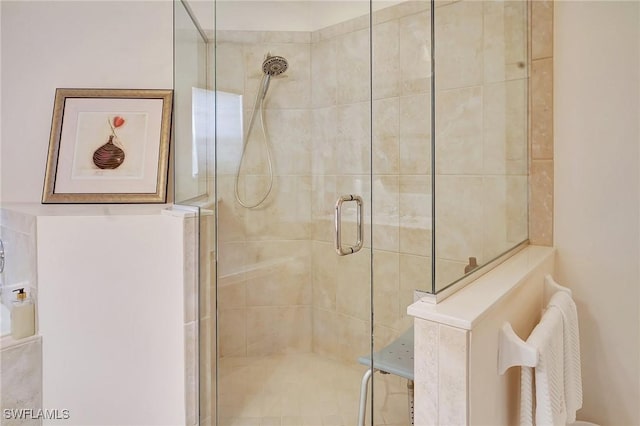 bathroom featuring an enclosed shower