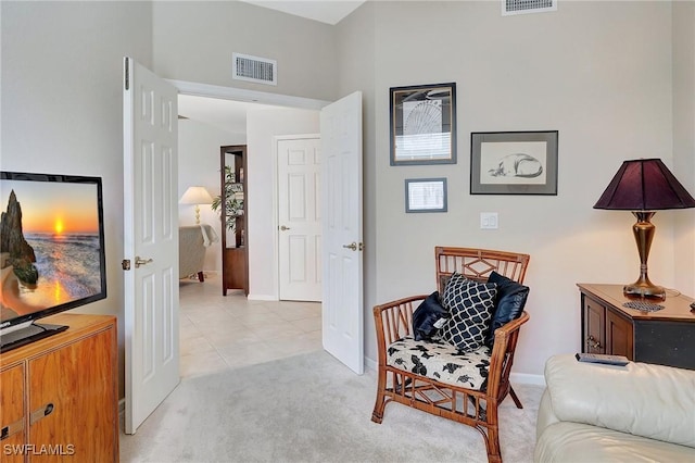 living area with light tile patterned floors