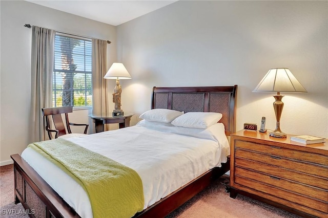 bedroom featuring dark carpet