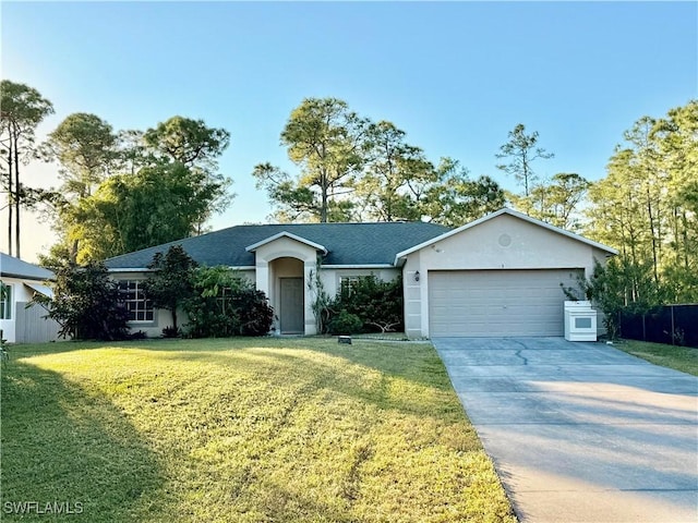 ranch-style home featuring a garage and a front lawn