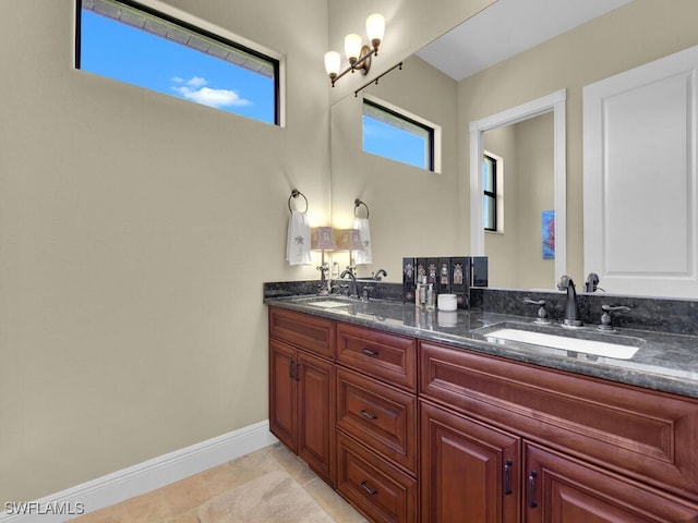 bathroom with vanity and tile patterned flooring