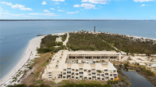 bird's eye view featuring a beach view and a water view