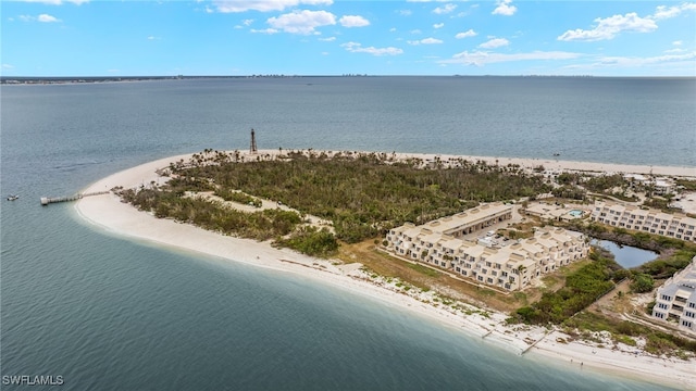 aerial view featuring a water view and a view of the beach