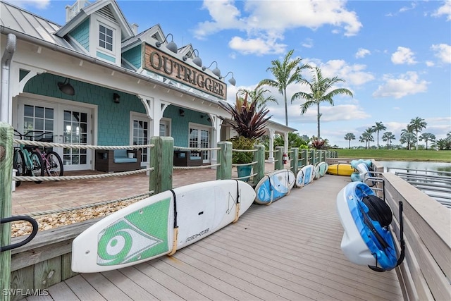 dock area with a water view