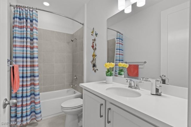 full bathroom featuring tile patterned flooring, vanity, shower / bath combination with curtain, and toilet