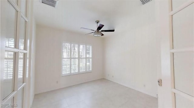 unfurnished room with ceiling fan