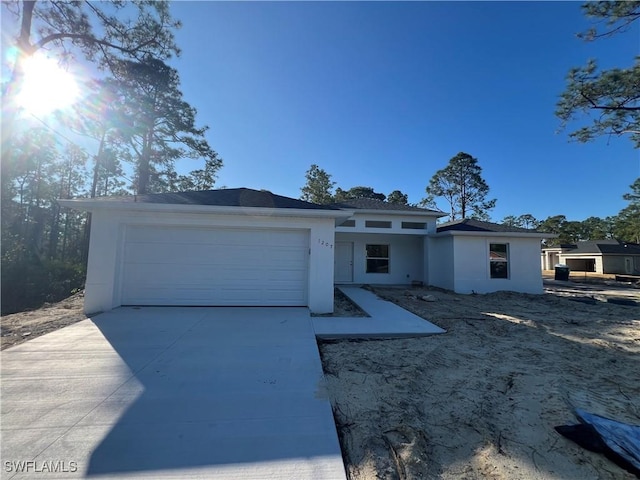 view of front of property featuring a garage