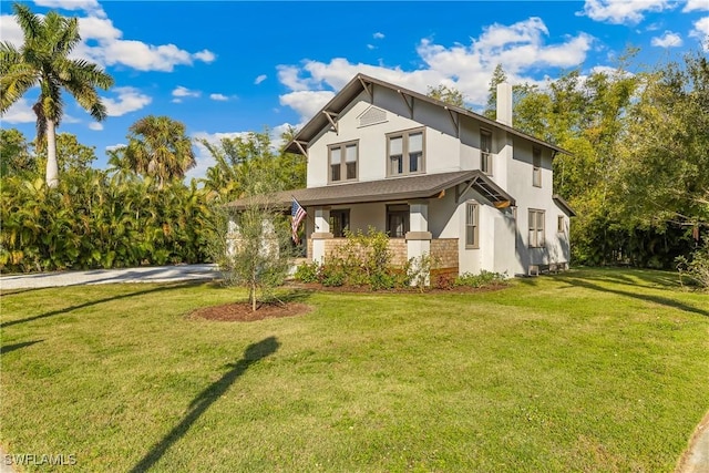 view of front of property with a front yard