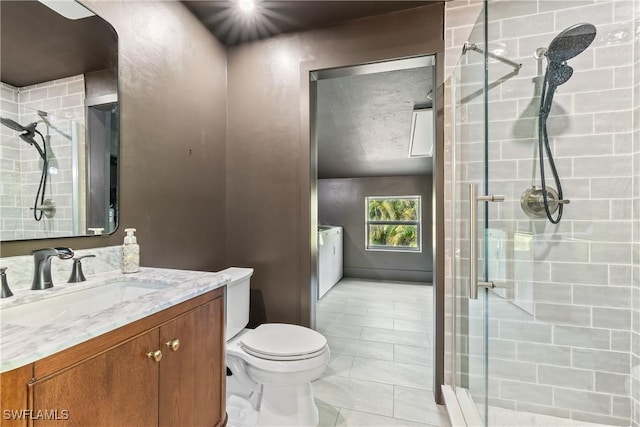 bathroom with vanity, toilet, and walk in shower