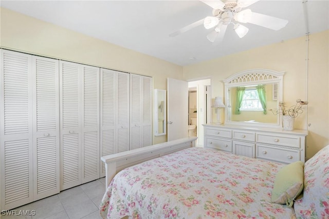 bedroom with ceiling fan, a closet, and light tile patterned floors