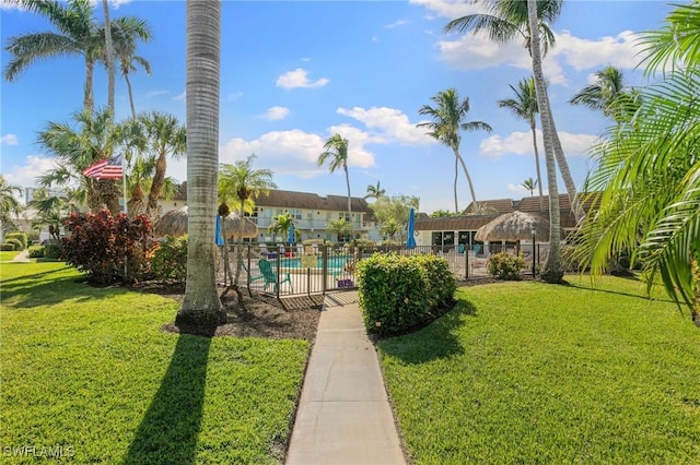 view of yard featuring a community pool