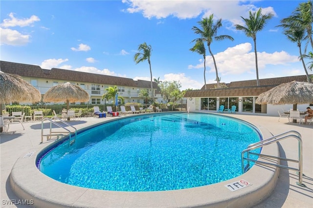 view of swimming pool featuring a patio area