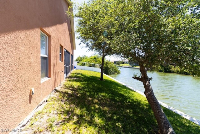 view of yard with a water view