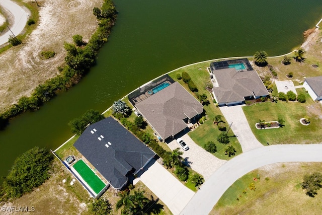 birds eye view of property featuring a water view