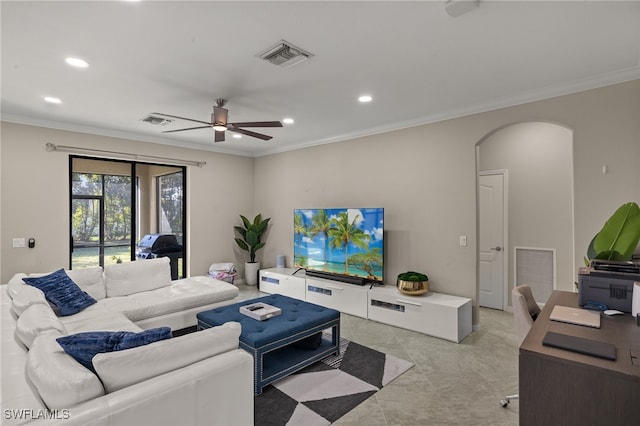 living room featuring ornamental molding and ceiling fan