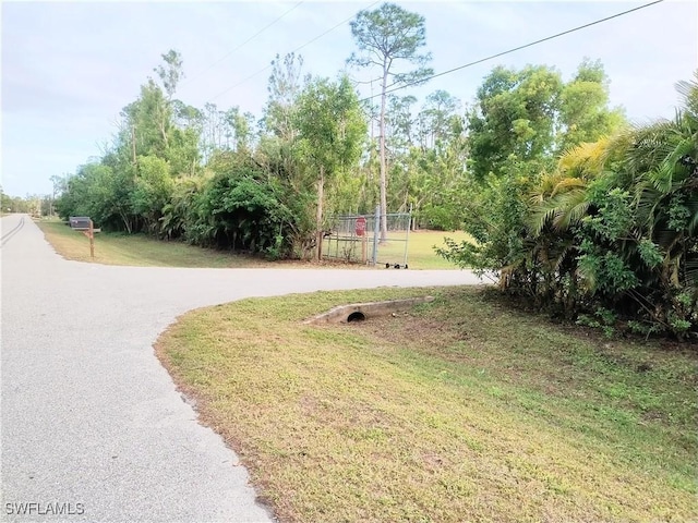 surrounding community featuring a lawn