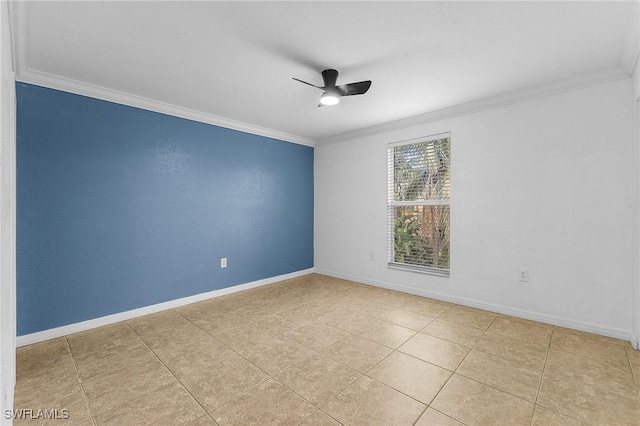 empty room featuring ornamental molding, baseboards, and a ceiling fan