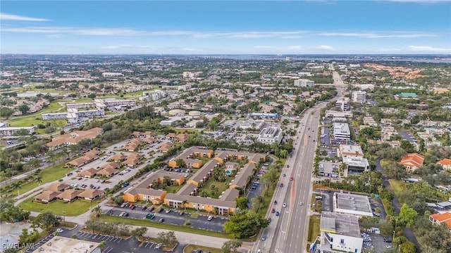 birds eye view of property with a residential view