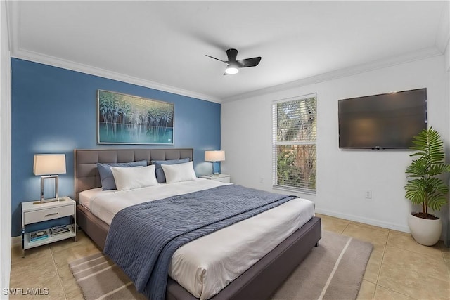 tiled bedroom with baseboards, ceiling fan, and crown molding