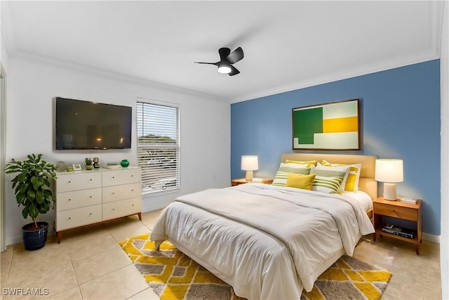 bedroom with ornamental molding, light tile patterned flooring, and a ceiling fan