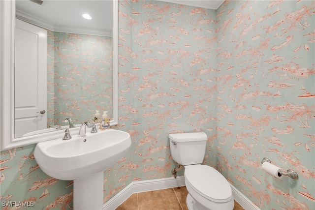 bathroom with baseboards, wallpapered walls, recessed lighting, tile patterned flooring, and toilet