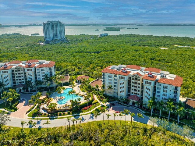 birds eye view of property featuring a water view